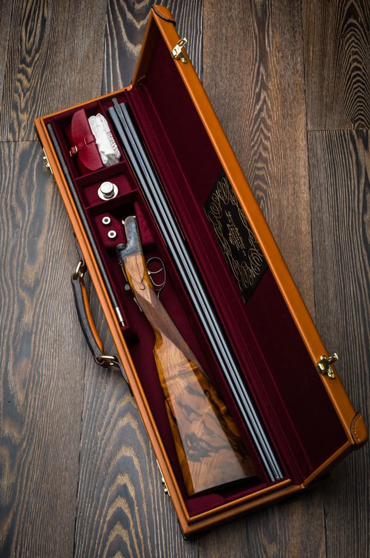 Sporting firearm presented in a fitted case